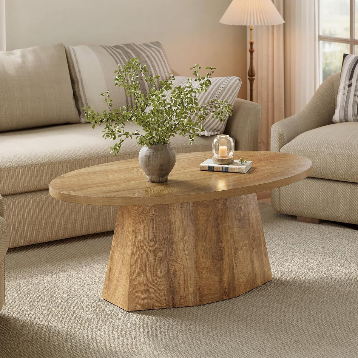 Modern Oval Coffee Table with Geometric Pedestal Base