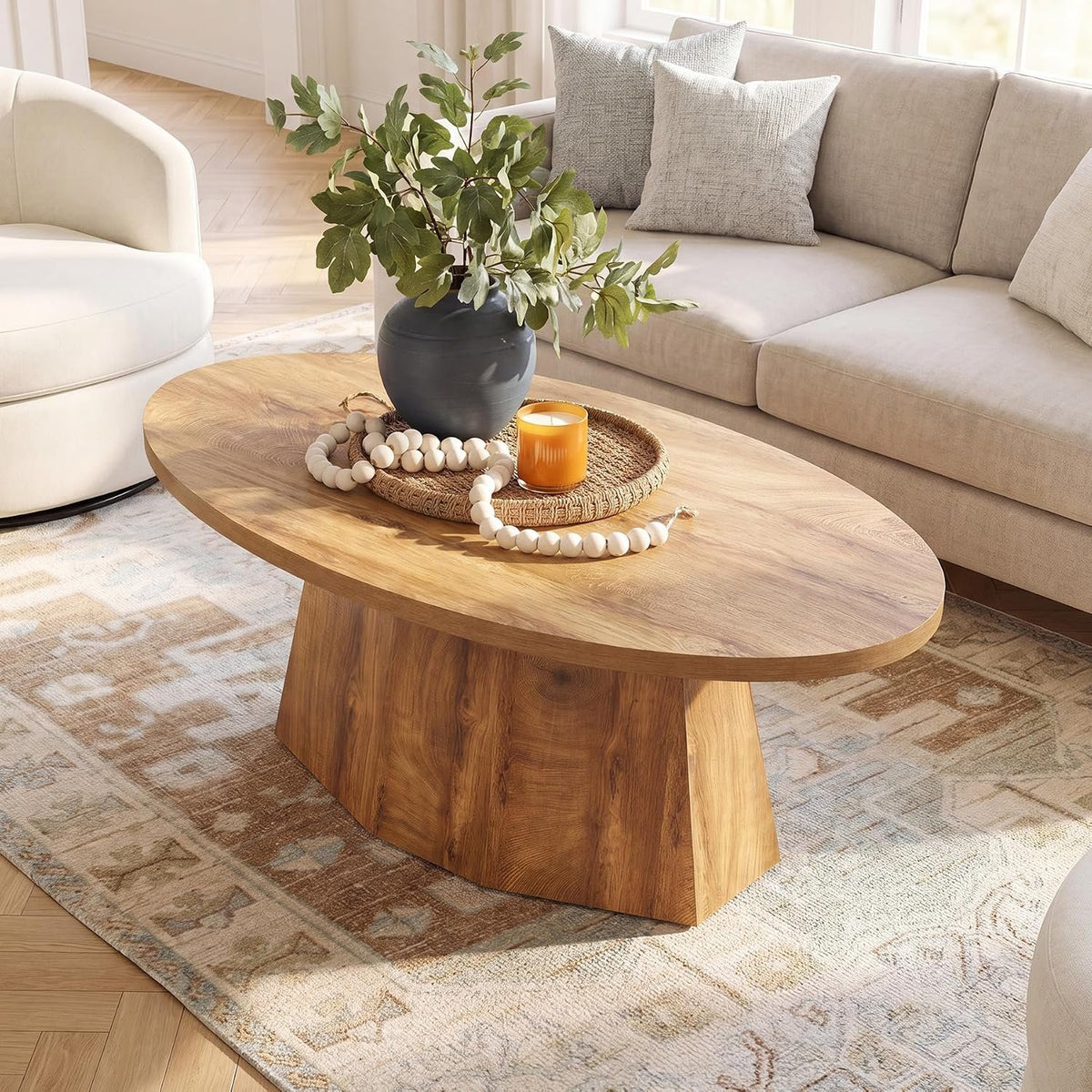 Modern Oval Coffee Table with Geometric Pedestal Base
